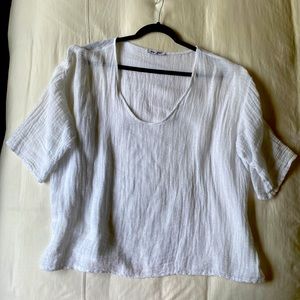 White lightweight shirt blouse to wear over a tank.